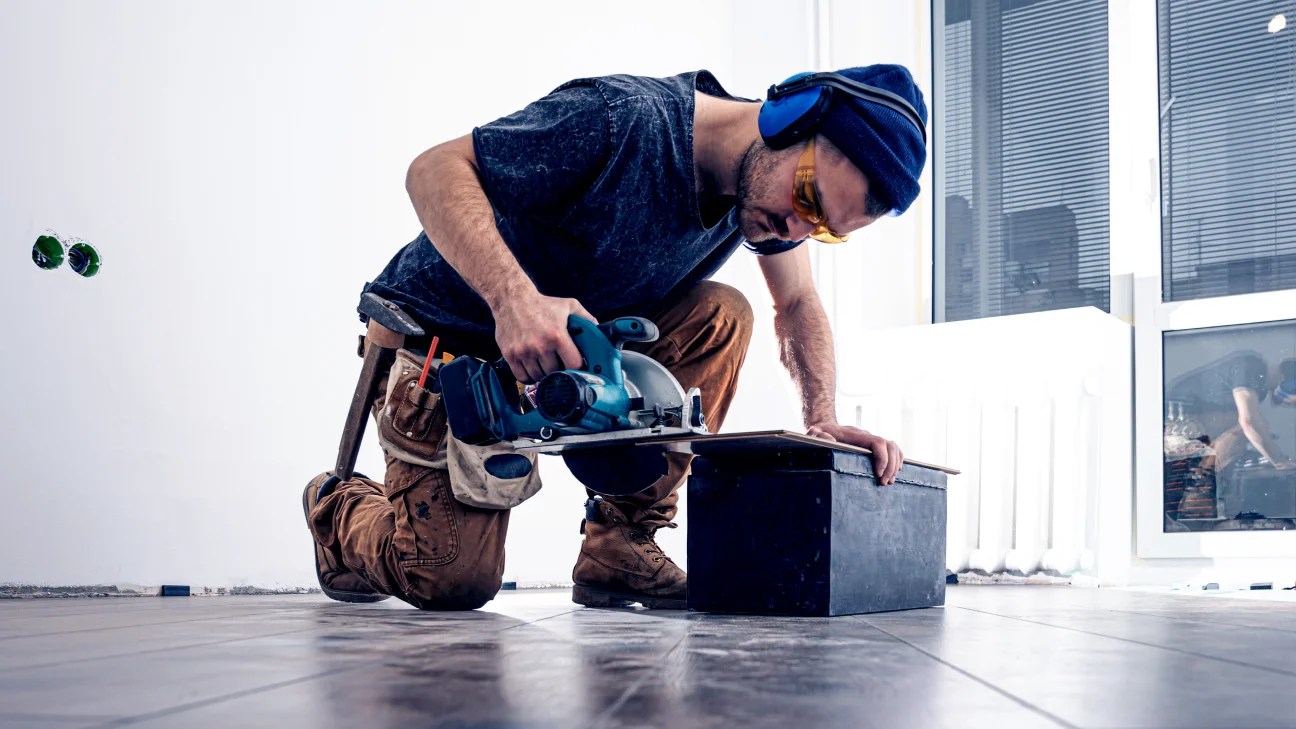 Saw Carpenter Using Circular Wood for Roofing